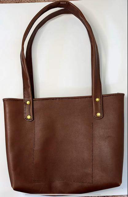 Woman’s wild boar leather bag.